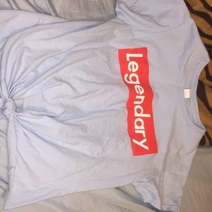 RUE 21 BLUE TIE IN FRONT “LEGENDARY” SHIRT